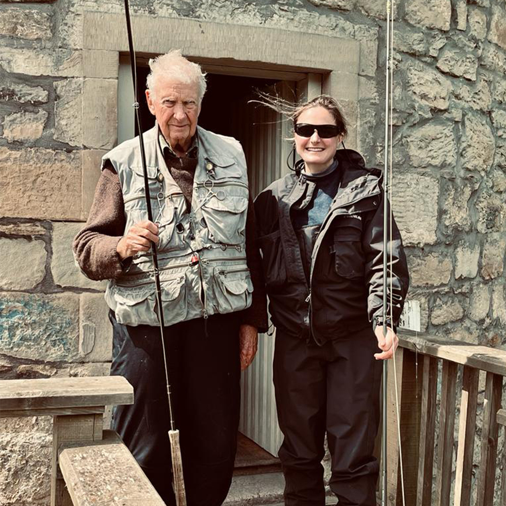 Longtime fisherman Mr Hayward and Georgina Maud standing infant of the fishing sheil